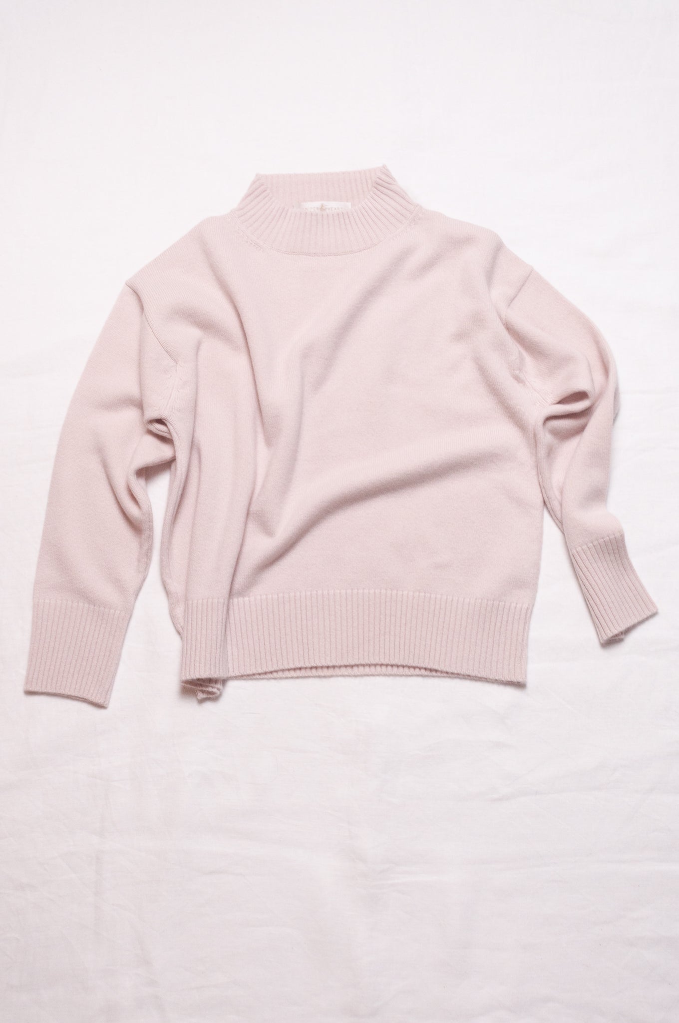Juniper Hearth high neck turtleneck cashmere sweater in ecru cream.