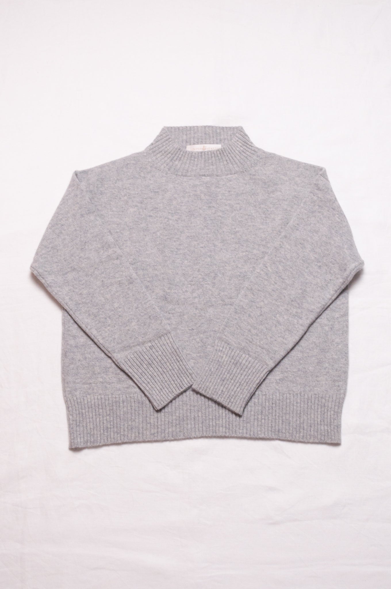 Juniper Hearth high neck turtleneck cashmere sweater in ash grey.