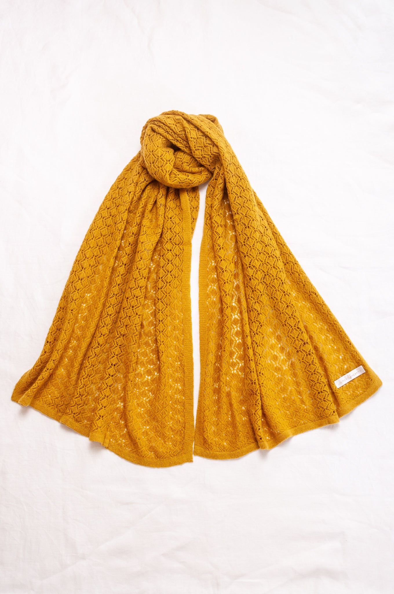 Cashmere wool blend lace work scarf wrap shawl in amber yellow mustard.