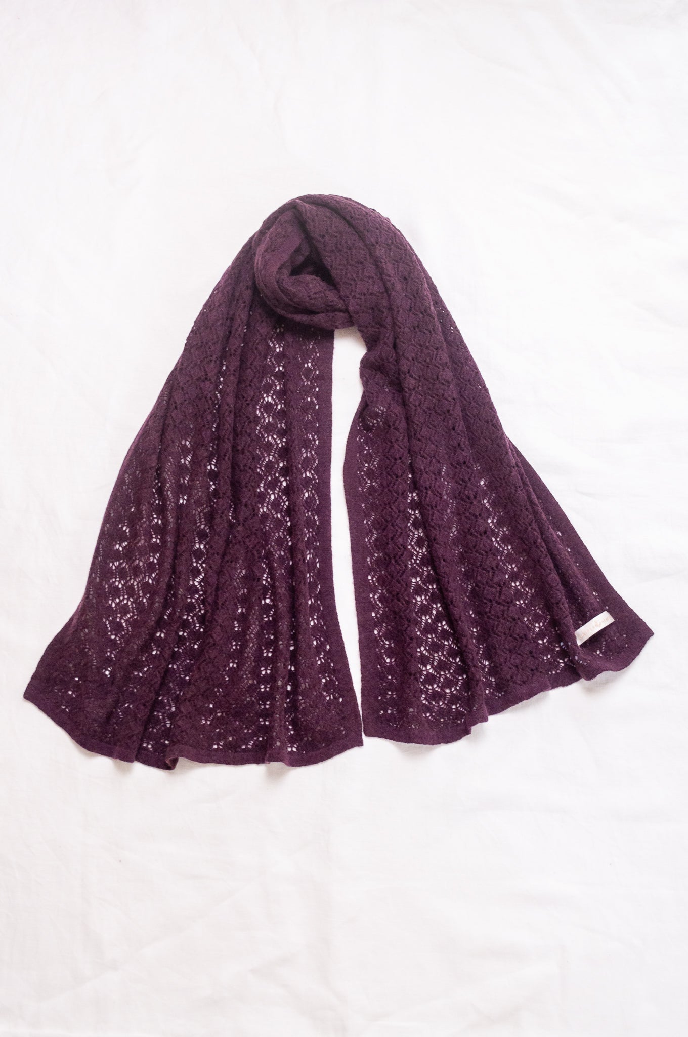 Cashmere wool blend lace work scarf wrap shawl in aubergine.