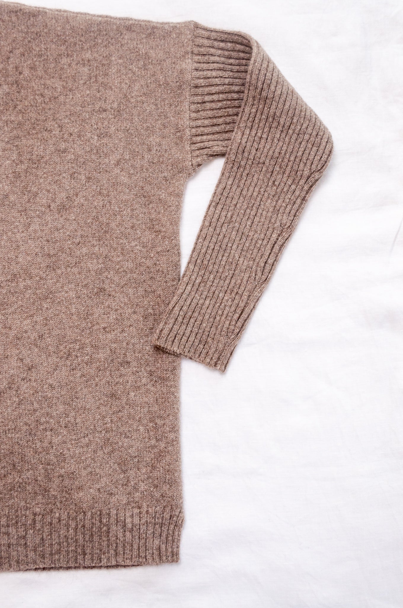 Maxim one size turtle neck rib sleeve sweater in natural baby yak wool.