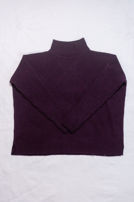 Baby yak wool Maxim one size turtle neck sweater with rib sleeves in aubergine.