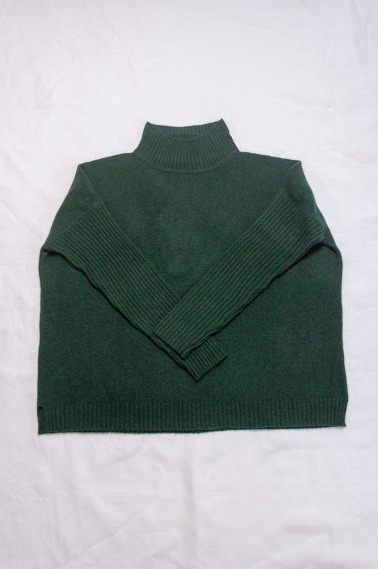 Baby yak wool Maxim one size turtle neck sweater with rib sleeves in dark hunter green forest green.