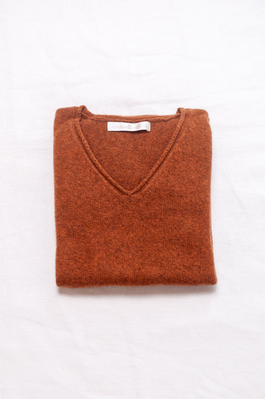 Baby yak wool Iris sweater V-neck loose fit in rust brown.