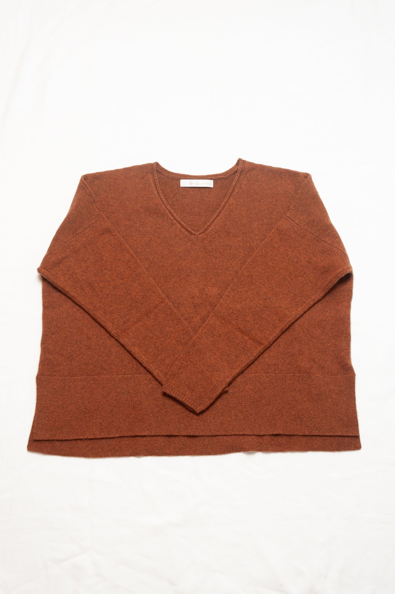 Baby yak wool Iris sweater V-neck loose fit in rust brown.
