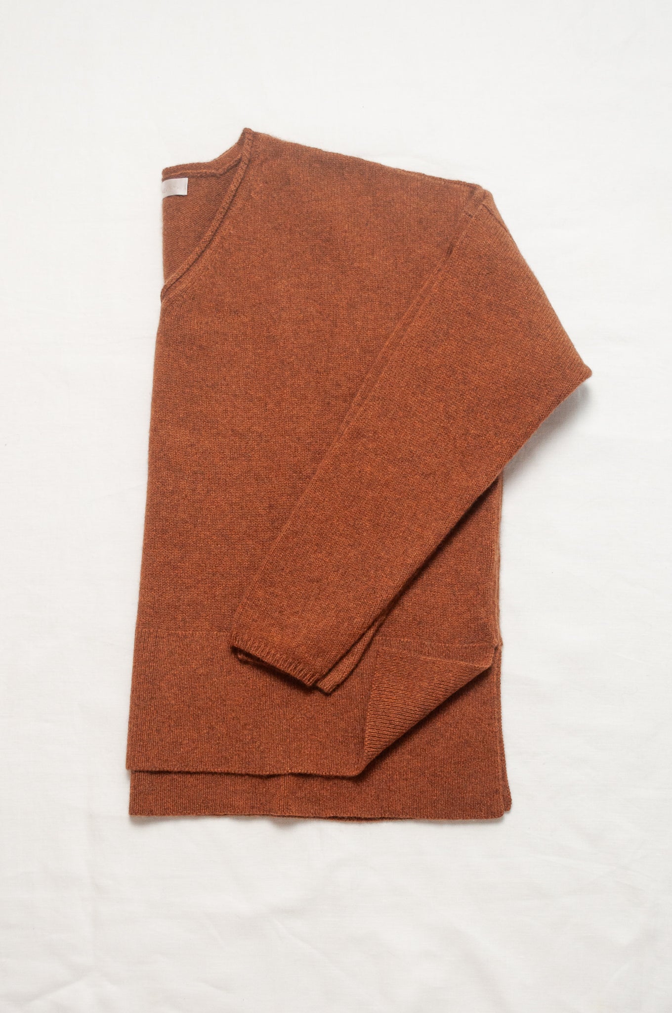 Baby yak wool Iris sweater V-neck loose fit in rust brown.
