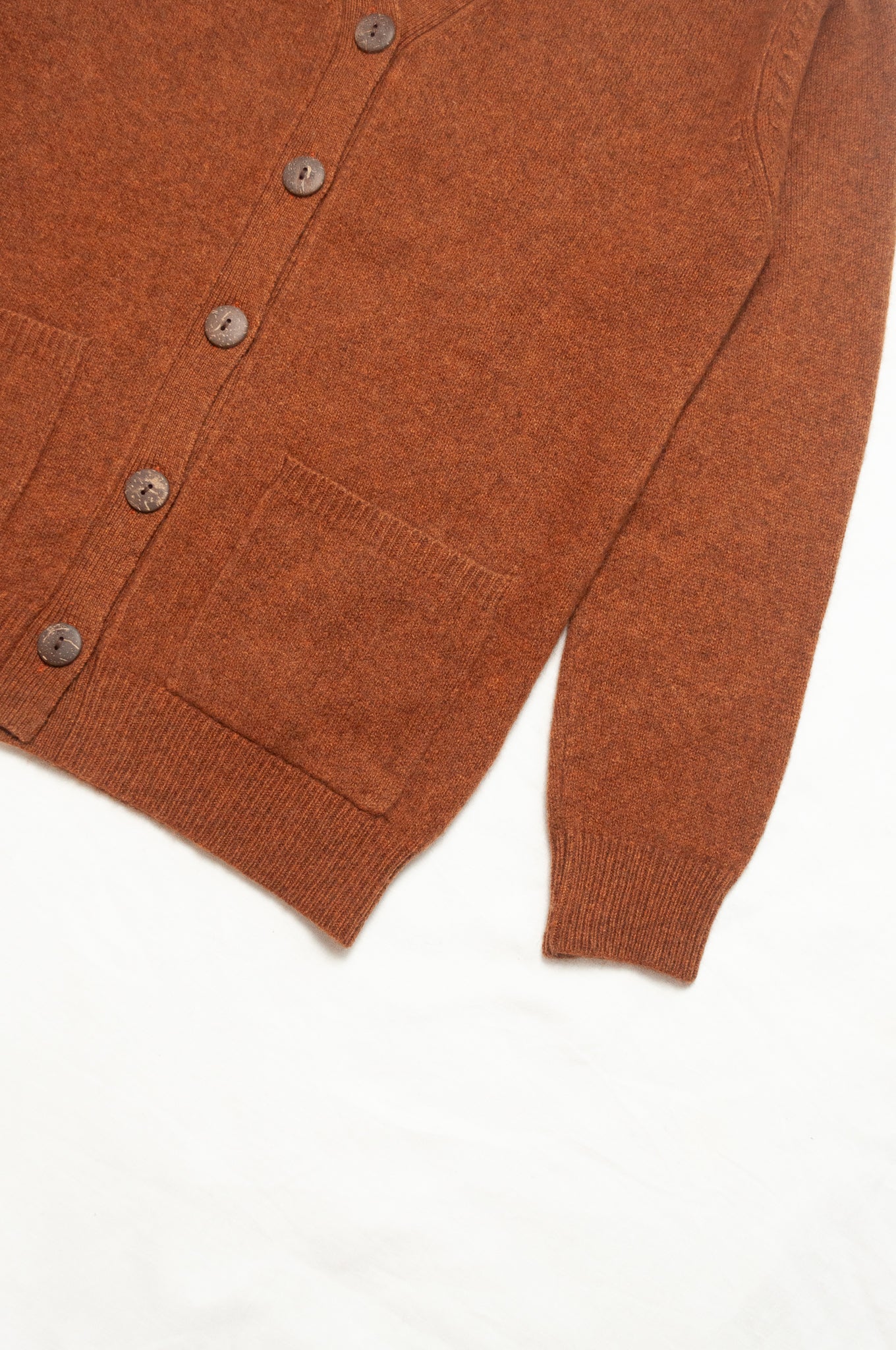 Baby yak wool Ines V-neck button up cardigan in rust brown.