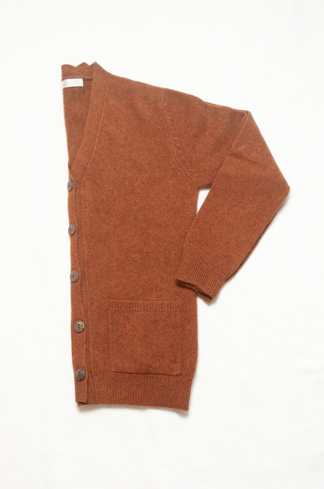 Baby yak wool Ines V-neck button up cardigan in rust brown.
