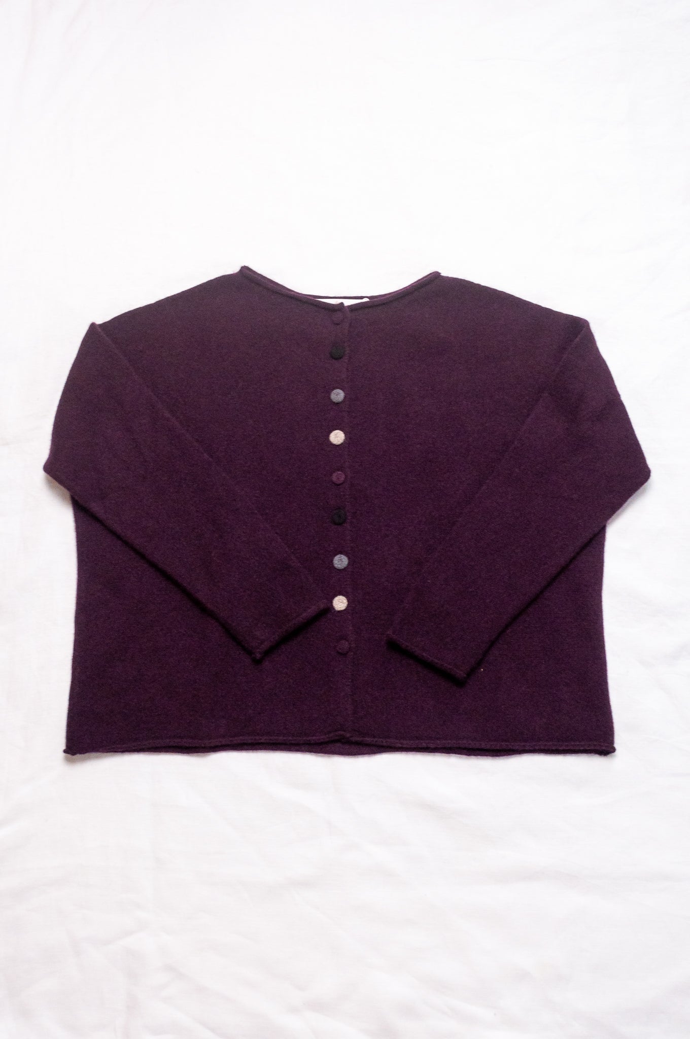 One size reversible baby yak wool cardigan in aubergine.