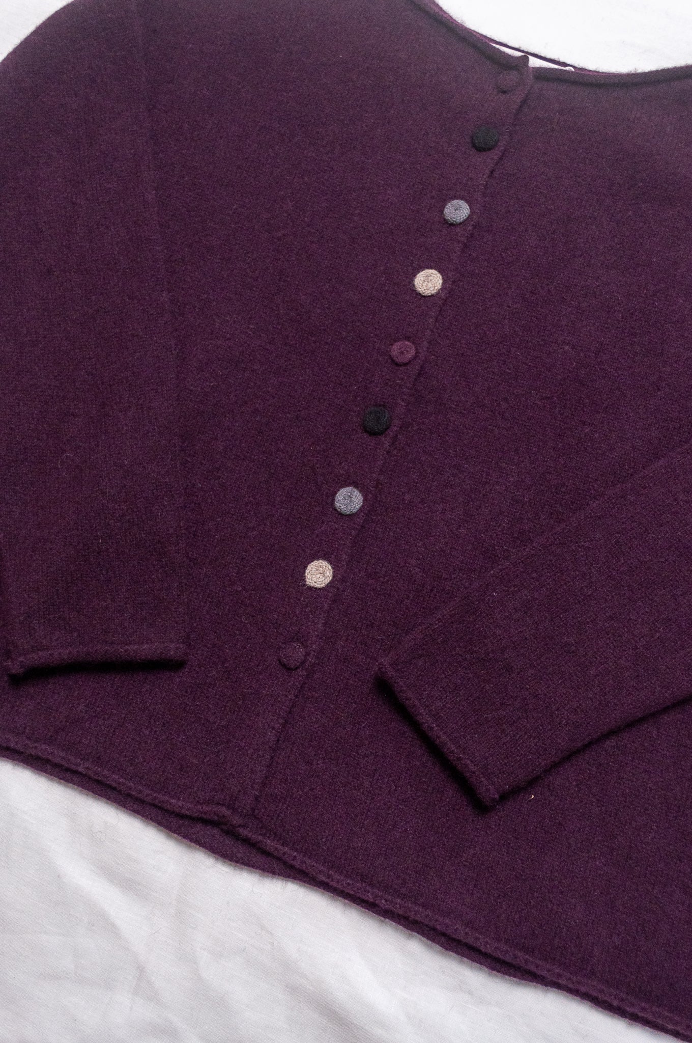 One size reversible baby yak wool cardigan in aubergine.