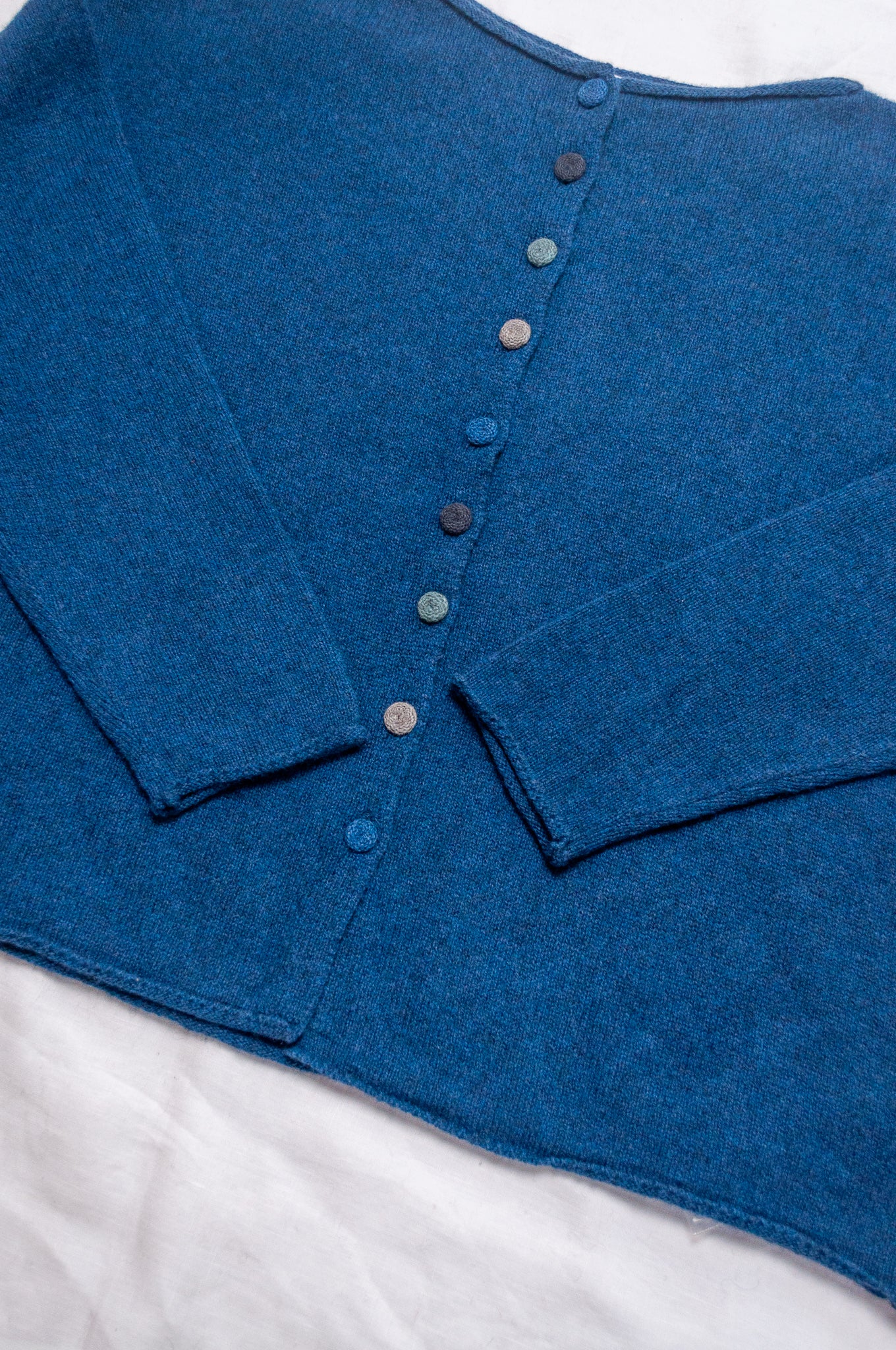 Baby yak wool one size reversible cardigan sweater in sapphire blue.