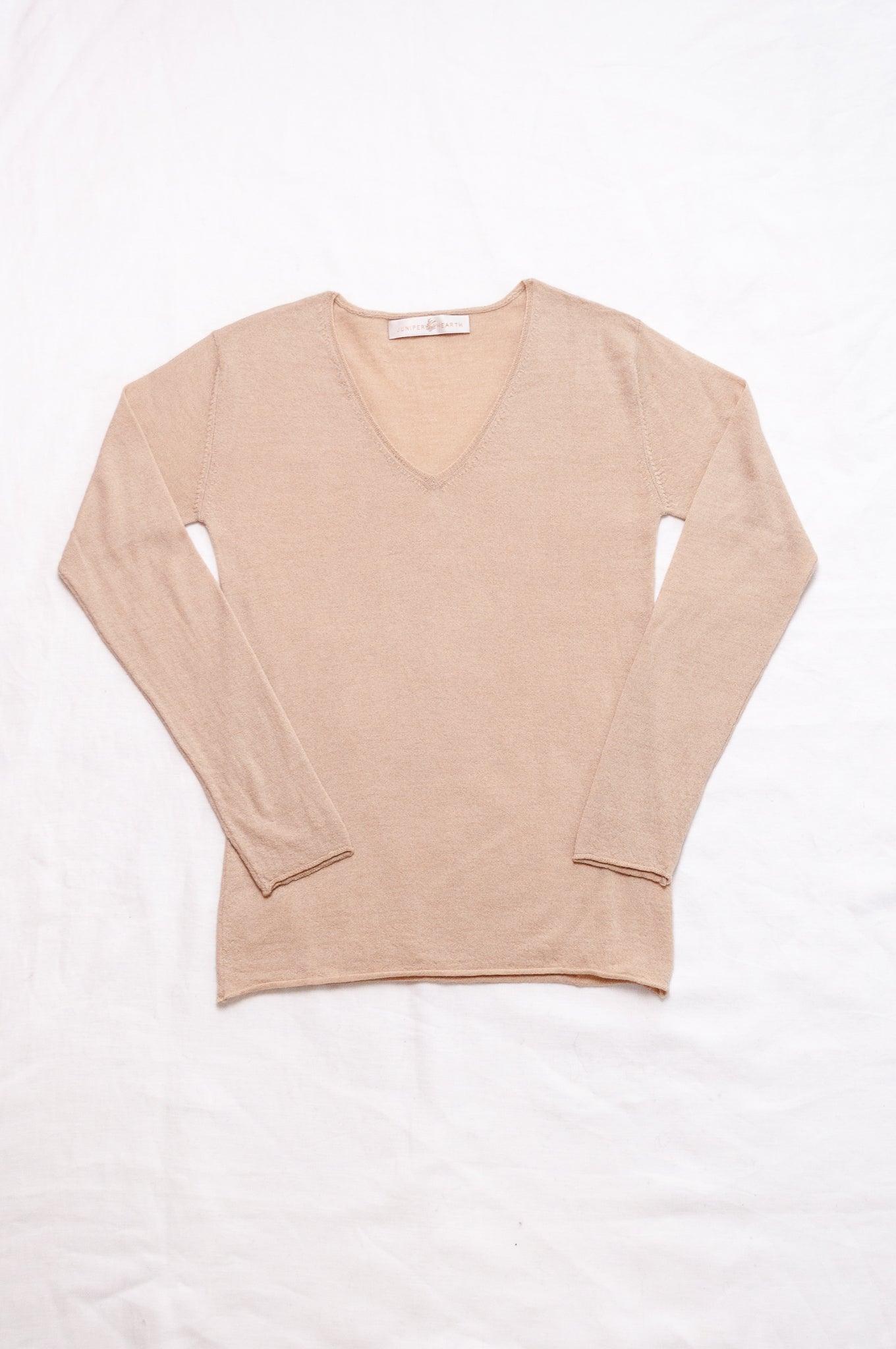 Lightweight pure cashmere sweater skin base layer in oatmeal.