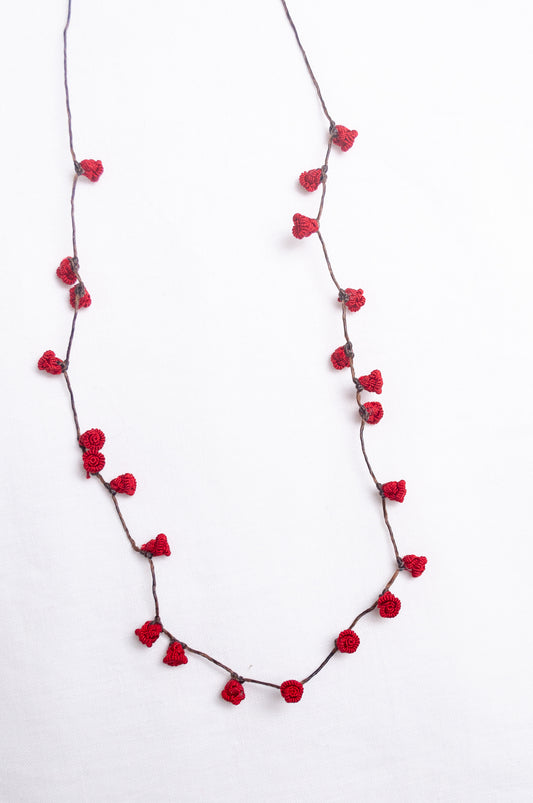 Handmade Moroccan button necklace in  rose red.