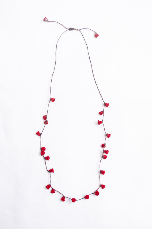 Handmade Moroccan button necklace in  rose red.
