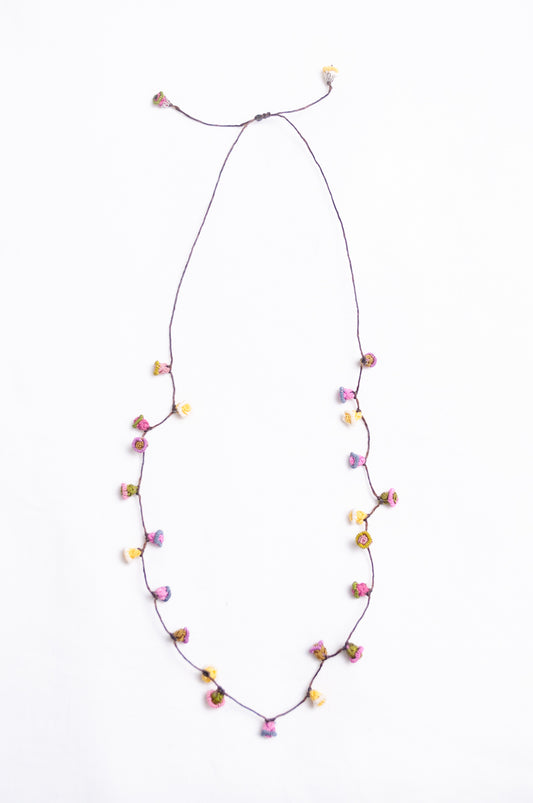 Handmade Moroccan button necklace in  soft pink, lemon and olive.