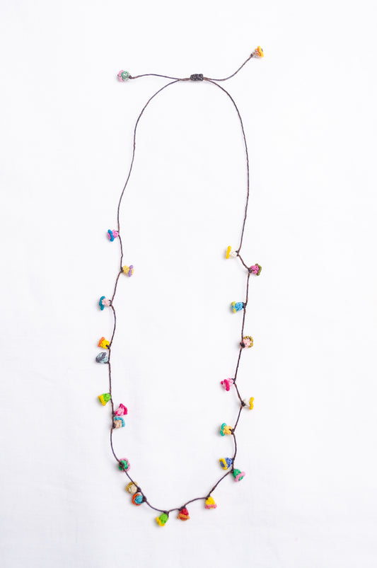 Handmade Moroccan button necklace in  bright pastels.