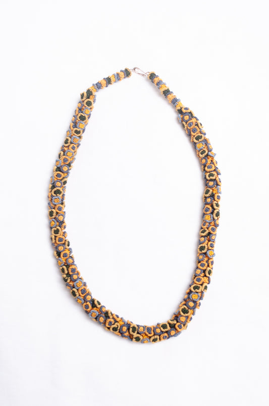 Moroccan flower button Oznati necklace in mustard yellow, latte and grey.