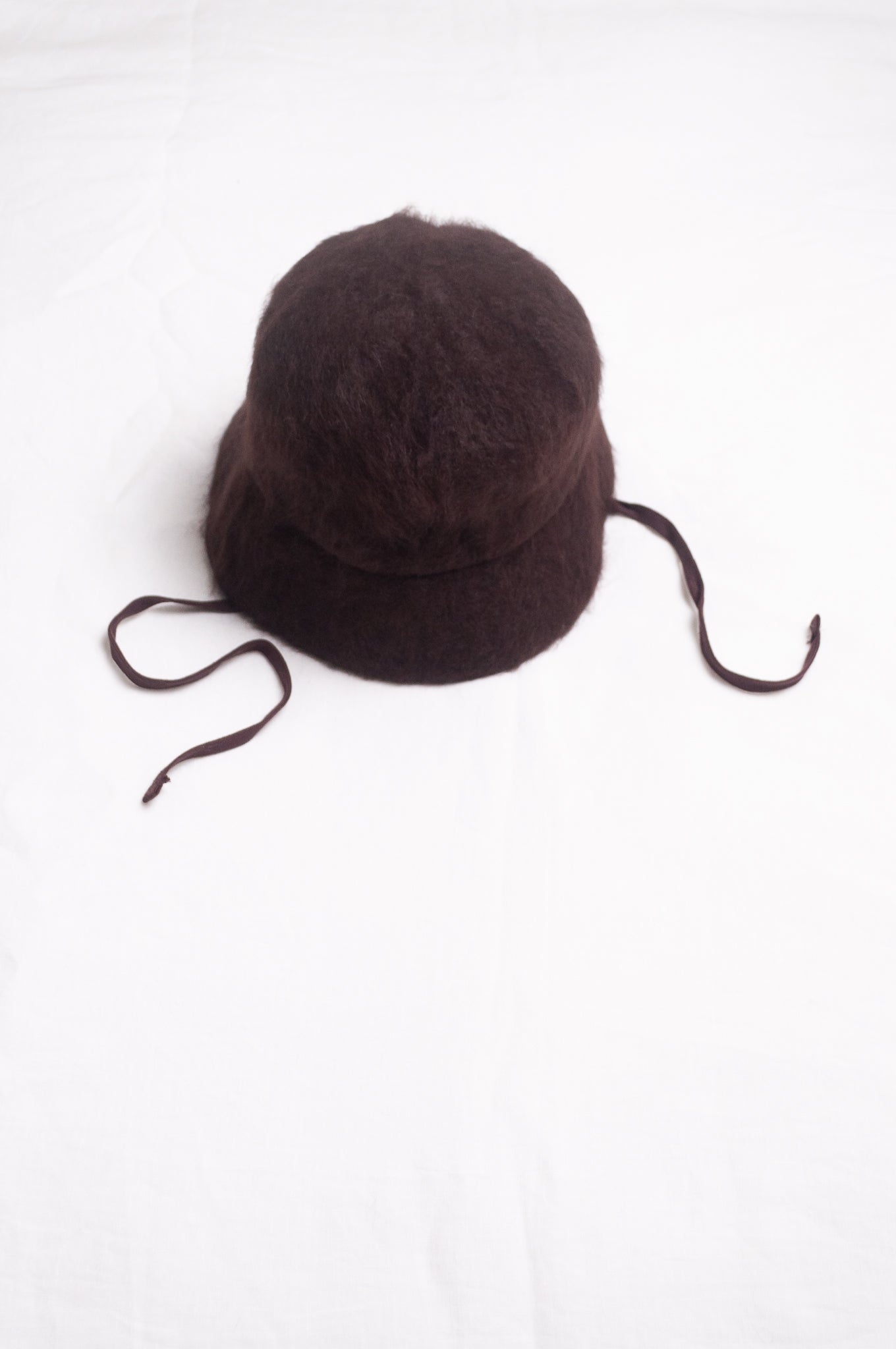 Parcnique PCNQ Angora felt cloche hat in brown.
