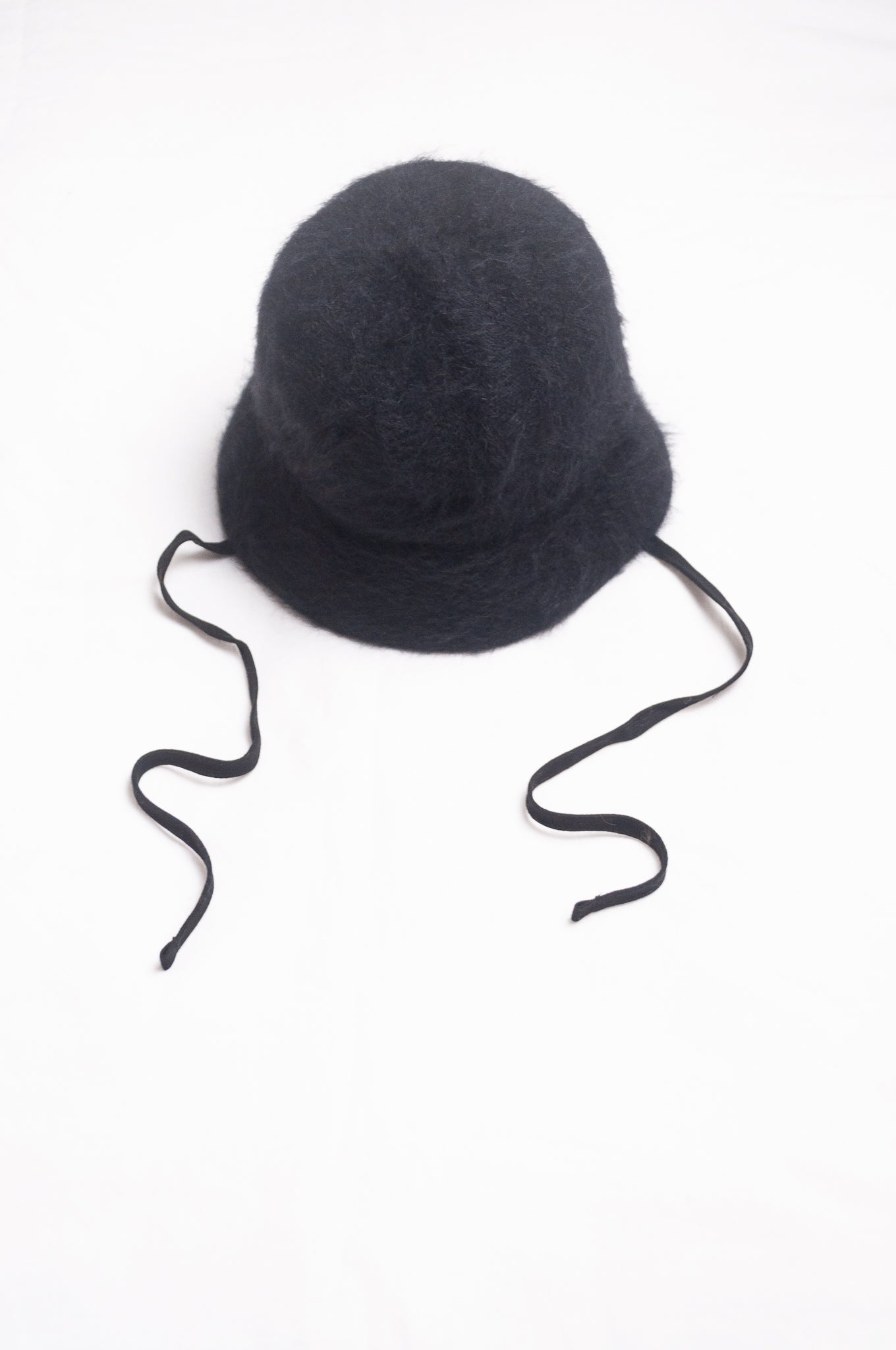 Parcnique PCNQ Bell cloche hat in angora wool blend with ribbon ties in black.