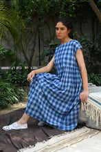 Load image into Gallery viewer, DVE classic Toshni dress in natural indigo check handloom cotton, short sleeves, gathered skirt.