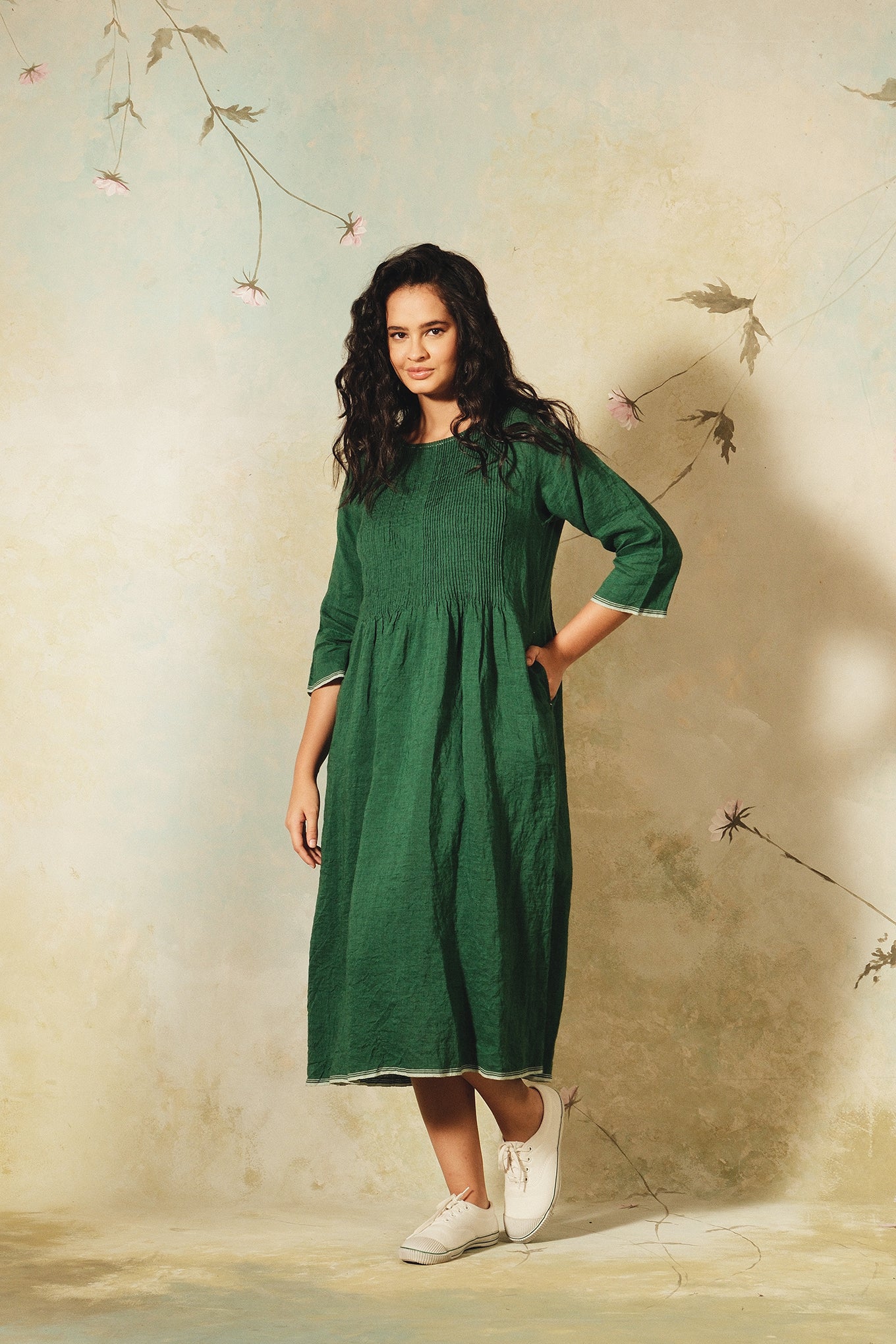 Dve emerald green linen Raka dress pintucked bodice, selvedge details.