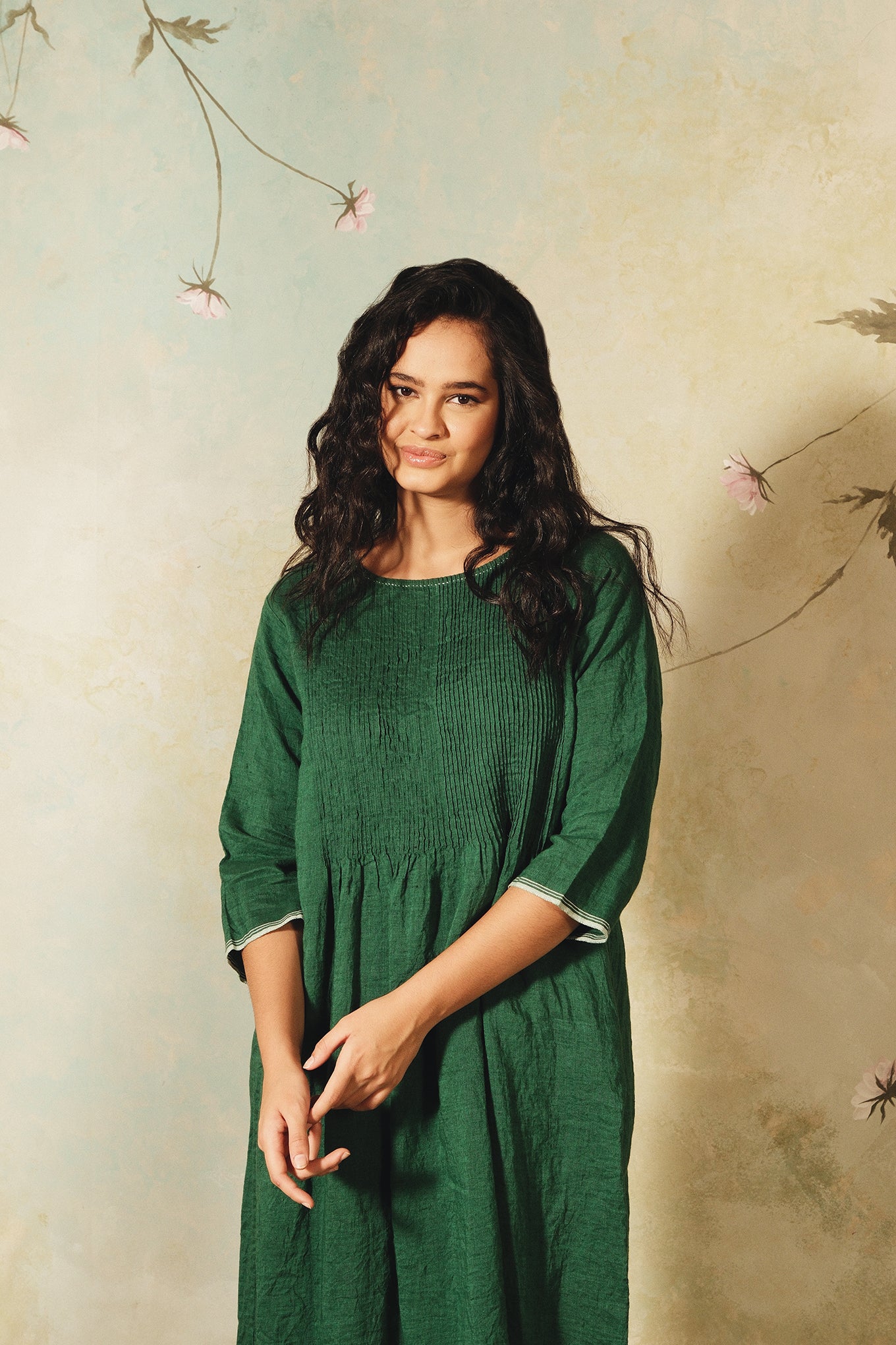 Dve emerald green linen Raka dress pintucked bodice, selvedge details.