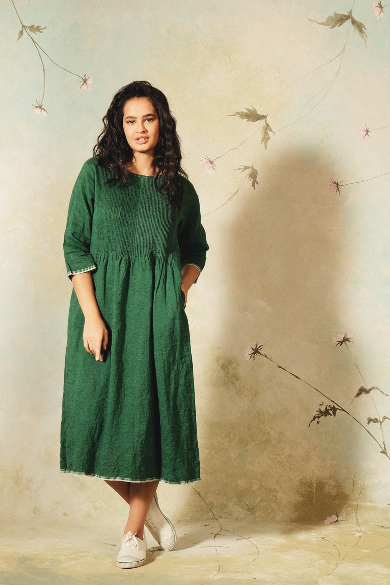 Dve emerald green linen Raka dress pintucked bodice, selvedge details.