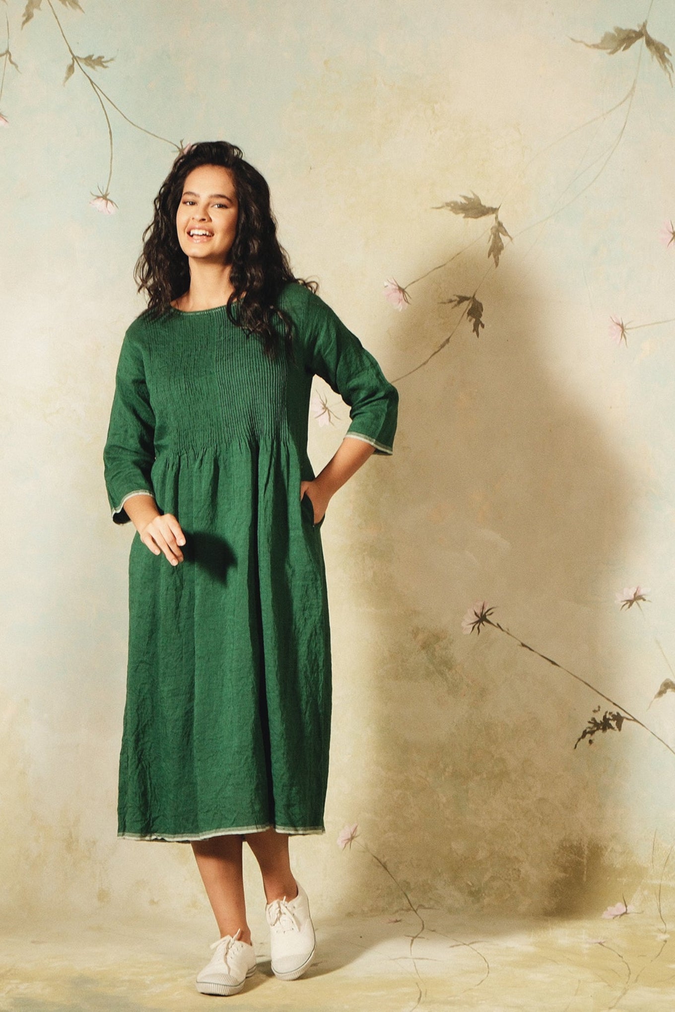 Dve emerald green linen Raka dress pintucked bodice, selvedge details.