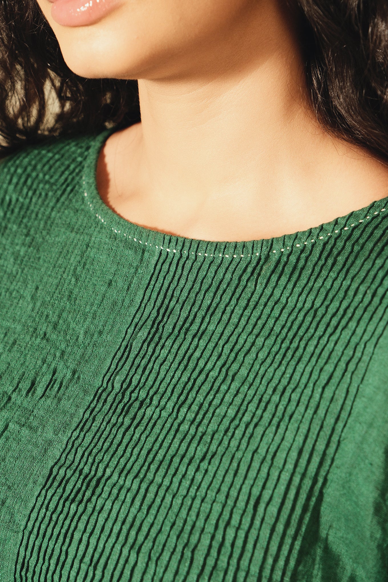 Dve emerald green linen Raka dress pintucked bodice, selvedge details - handstitched neck detail.