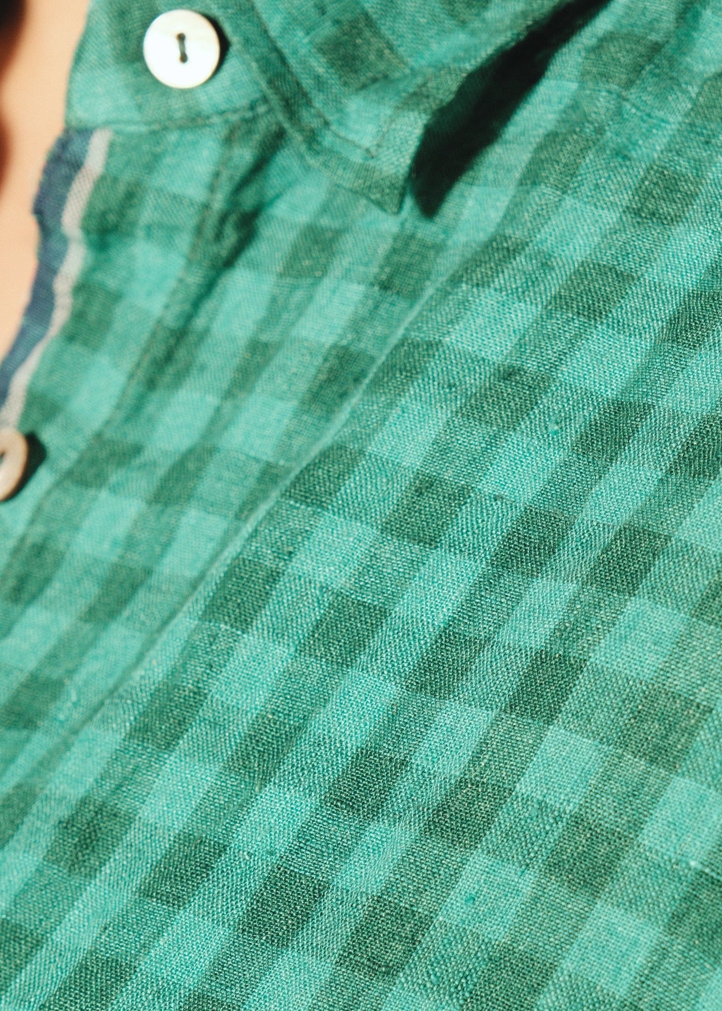 Dve Padmini emerald green linen check button up boxy collared shirt.