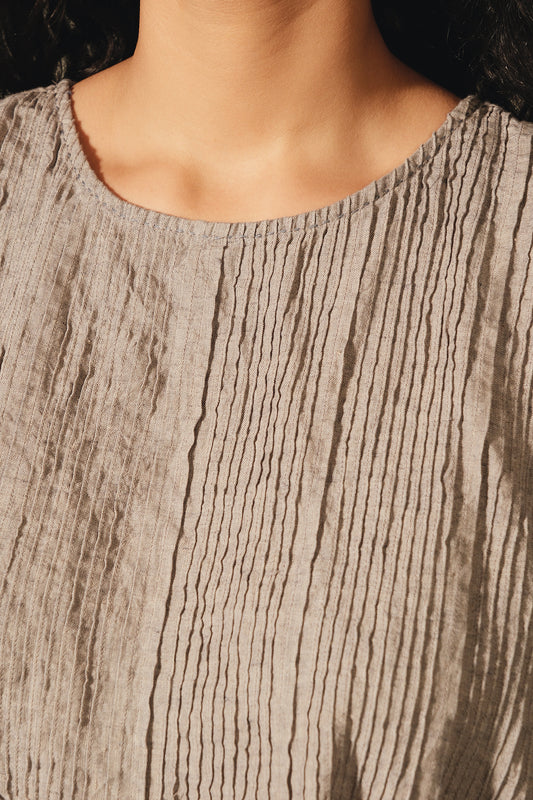 DVE Adya pintucked sleeveless linen top in ash beige linen.