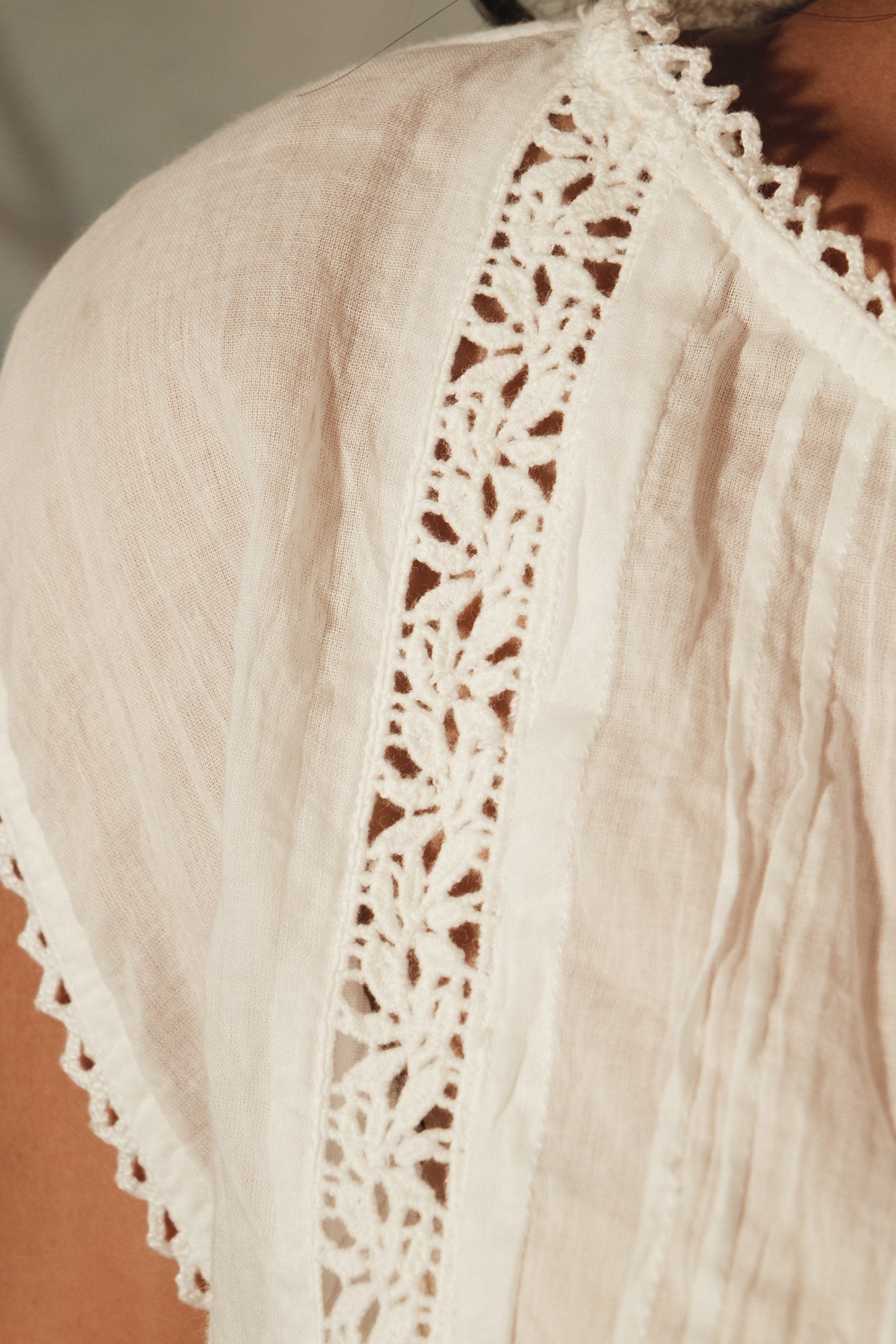 DVE Aishani white cotton voile top with lace insets.