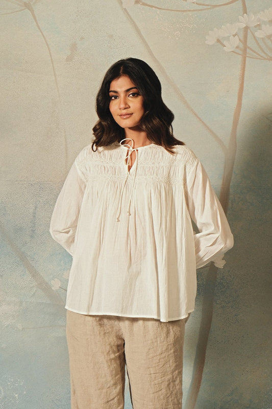 DVE Saha smocked cotton top in white.