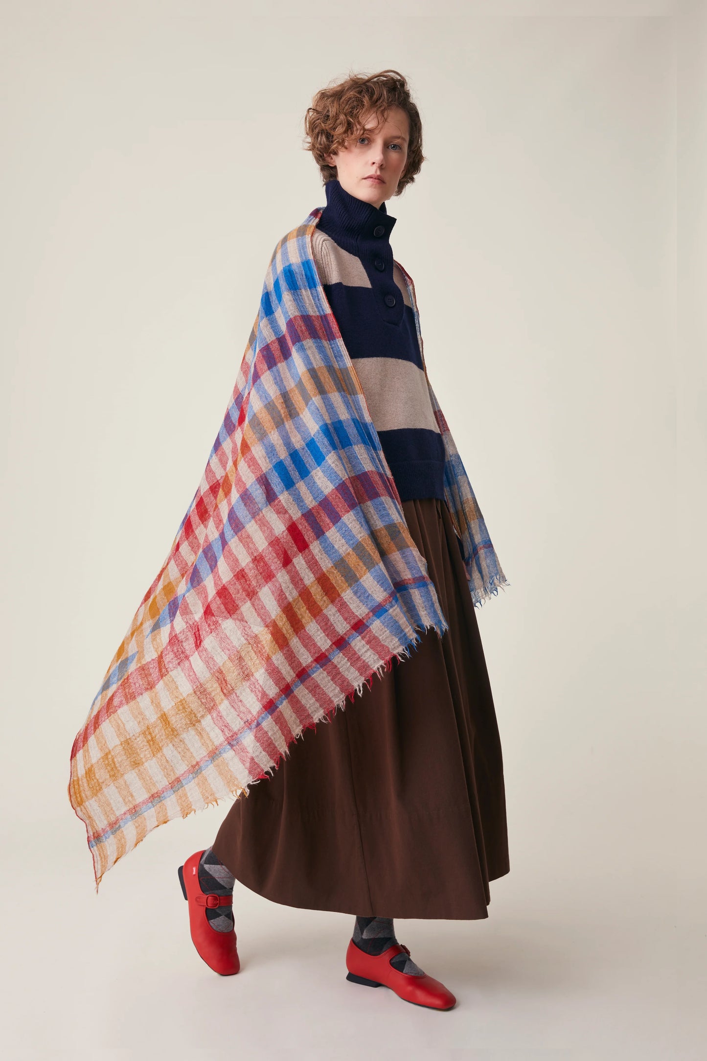 Moismont fine wool plaid tartan check scarf Acrobat in Celtic red, orange, mustard yellow, blue, tan and white.