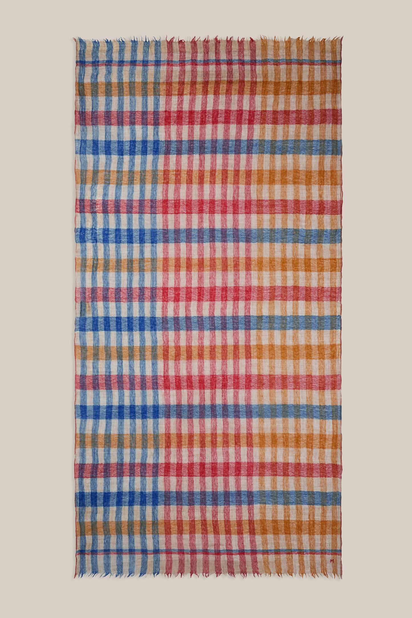 Moismont fine wool plaid tartan check scarf Acrobat in Celtic red, orange, mustard yellow, blue, tan and white.