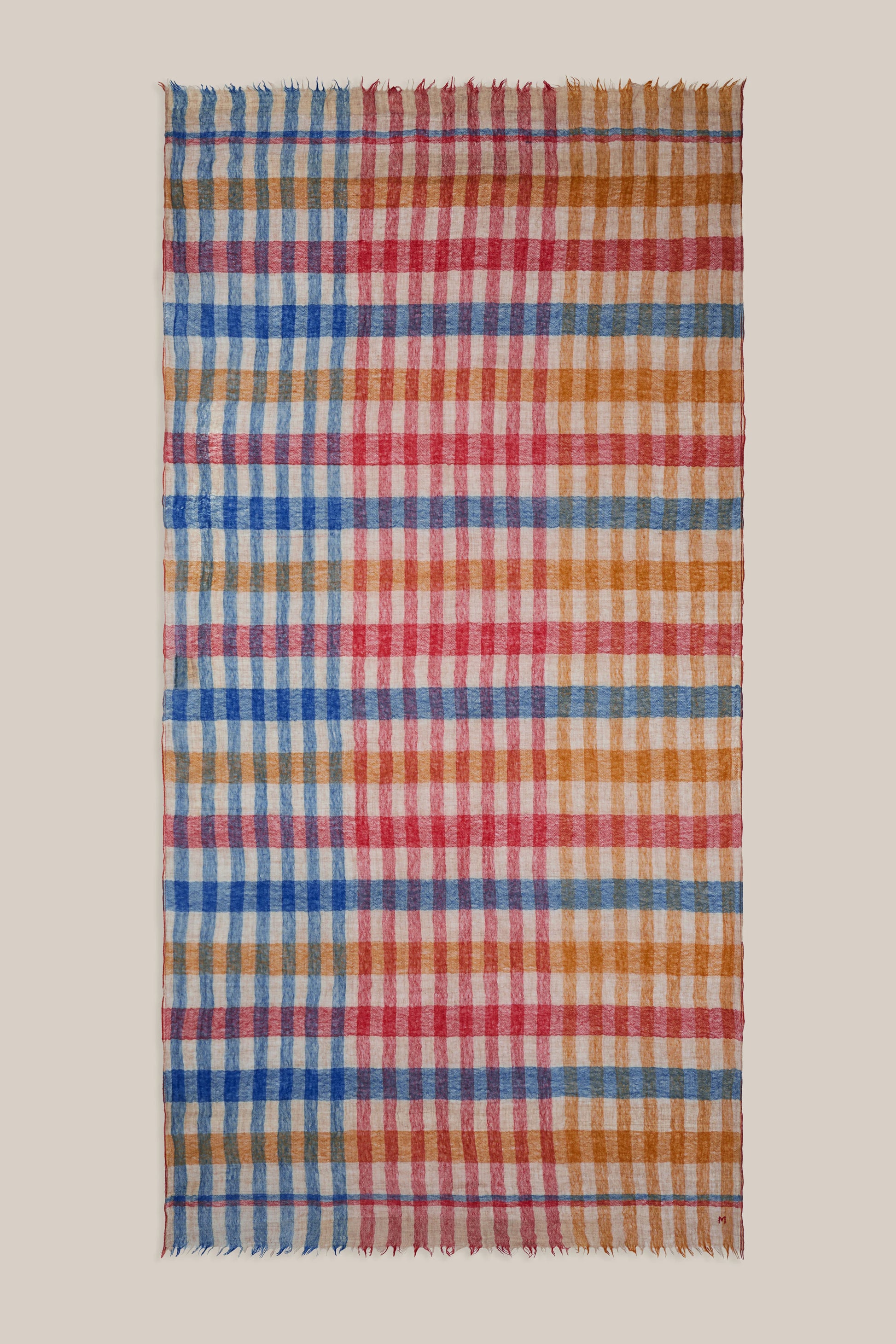 Moismont fine wool plaid tartan check scarf Acrobat in Celtic red, orange, mustard yellow, blue, tan and white.