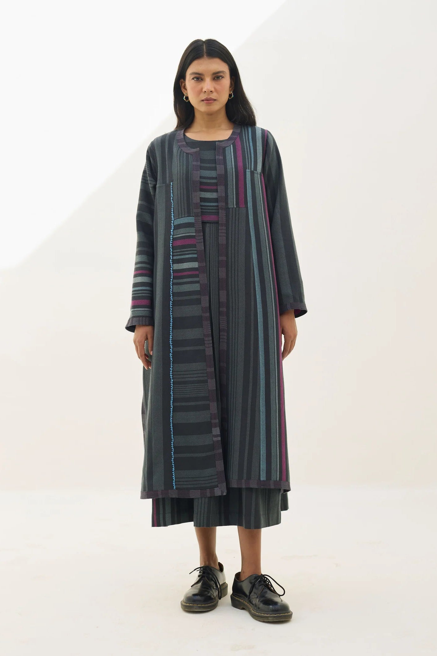 Manan Thena pure wool overlay jacket in charcoal grey stripe.