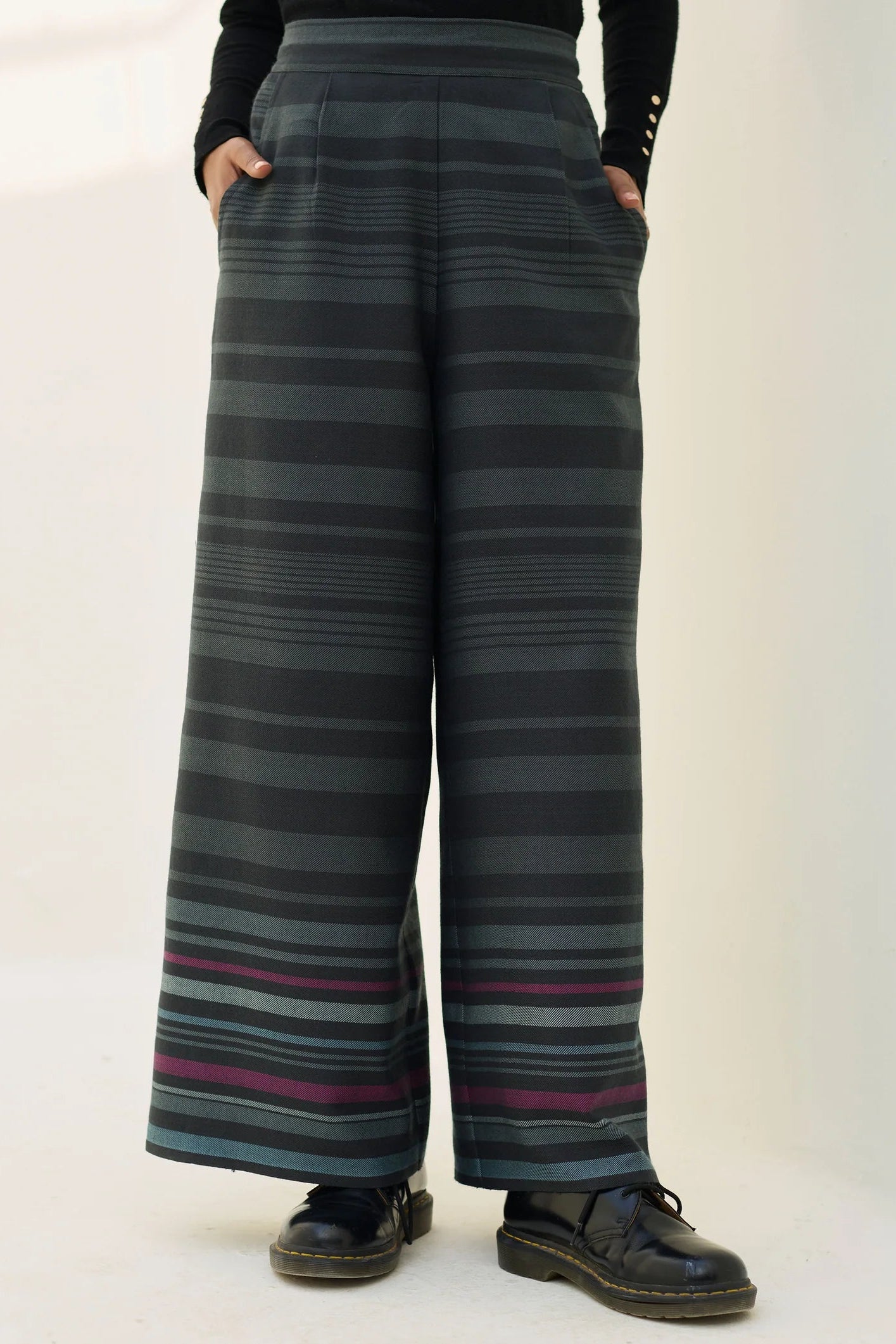 Manan Vola merino wool culootes with border stripe detail in charcoal.