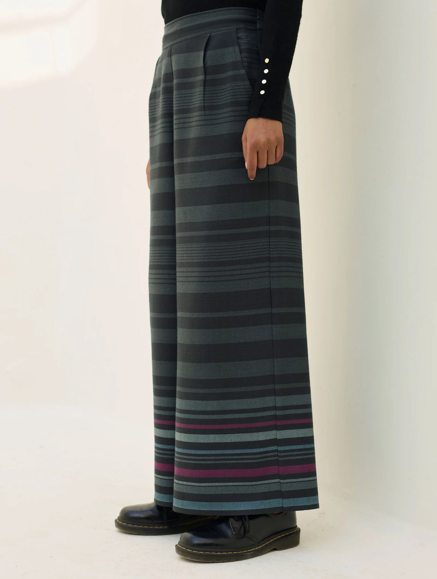 Manan Vola merino wool culootes with border stripe detail in charcoal.