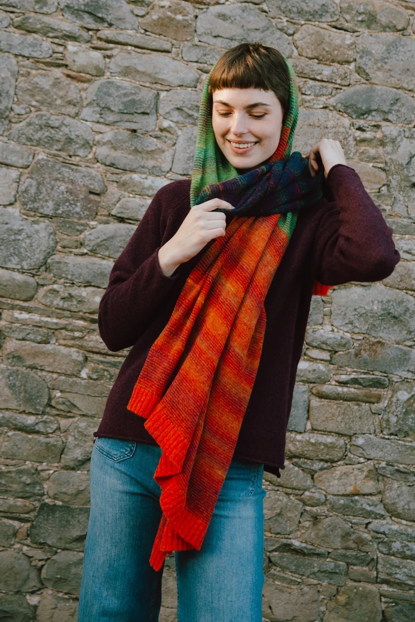 Eribe merino and mohair treeline wrap in Bellarose red blue and green.