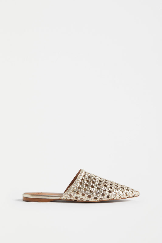 Elk Lyd woven leather mule in gold.
