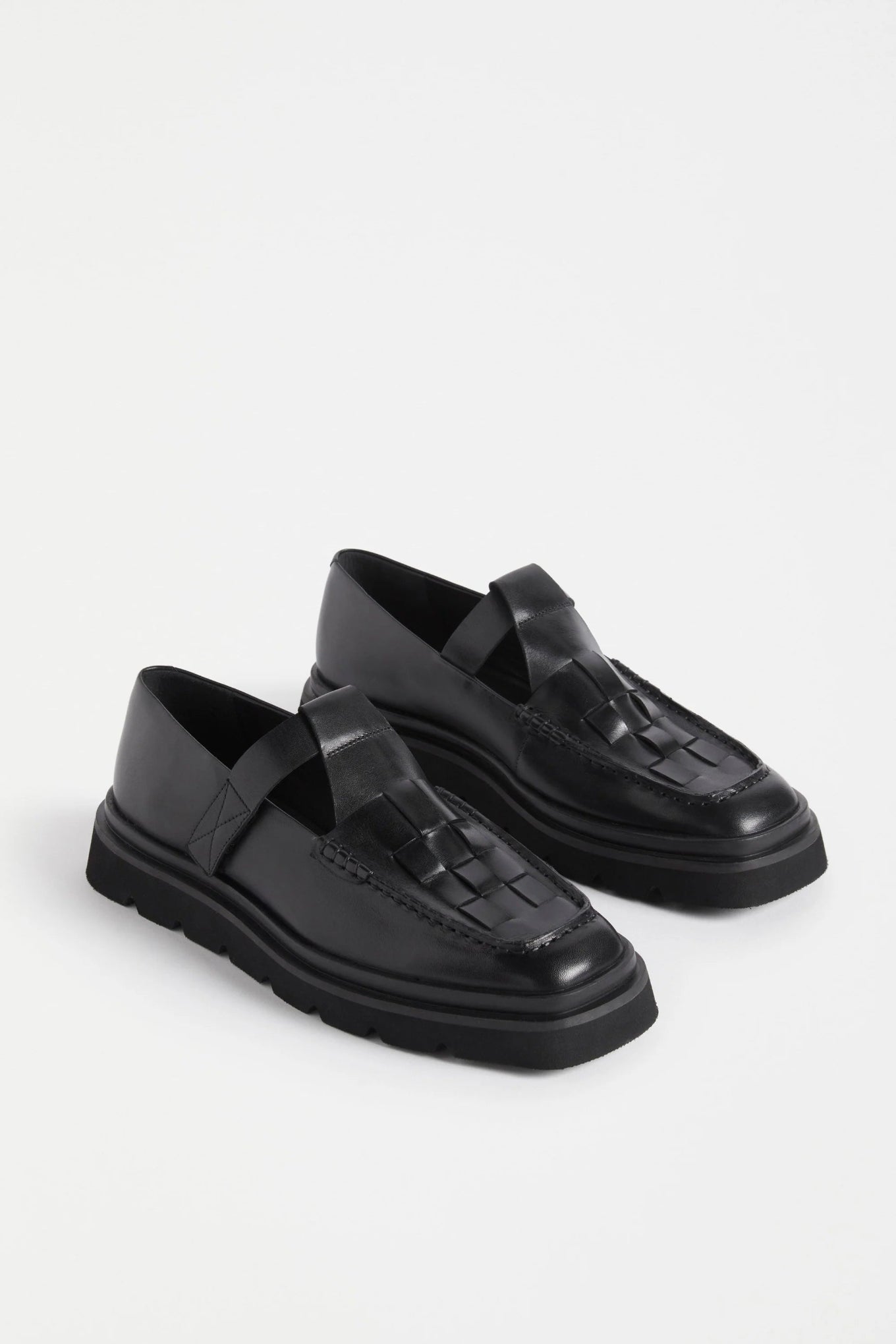 Elk Vadna black leather t-bar woven leather loafer.