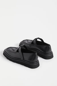 Elk Vadna black leather t-bar woven leather loafer.