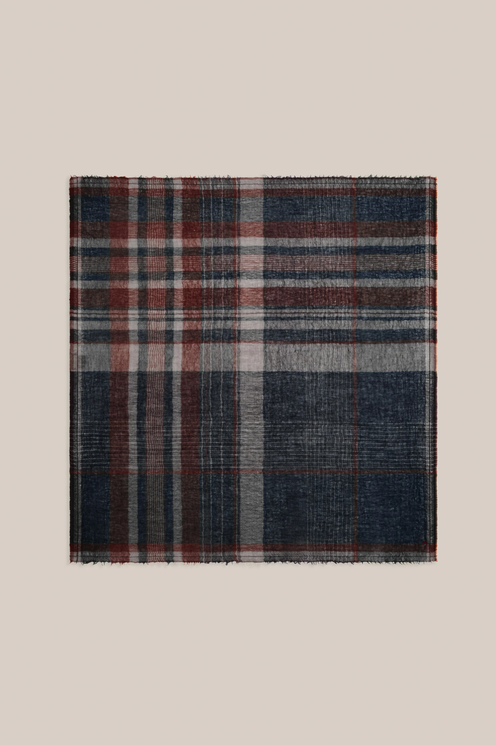 Moismont pure wool tartan Chai scarf in Celtic, navy, brown, and cream.