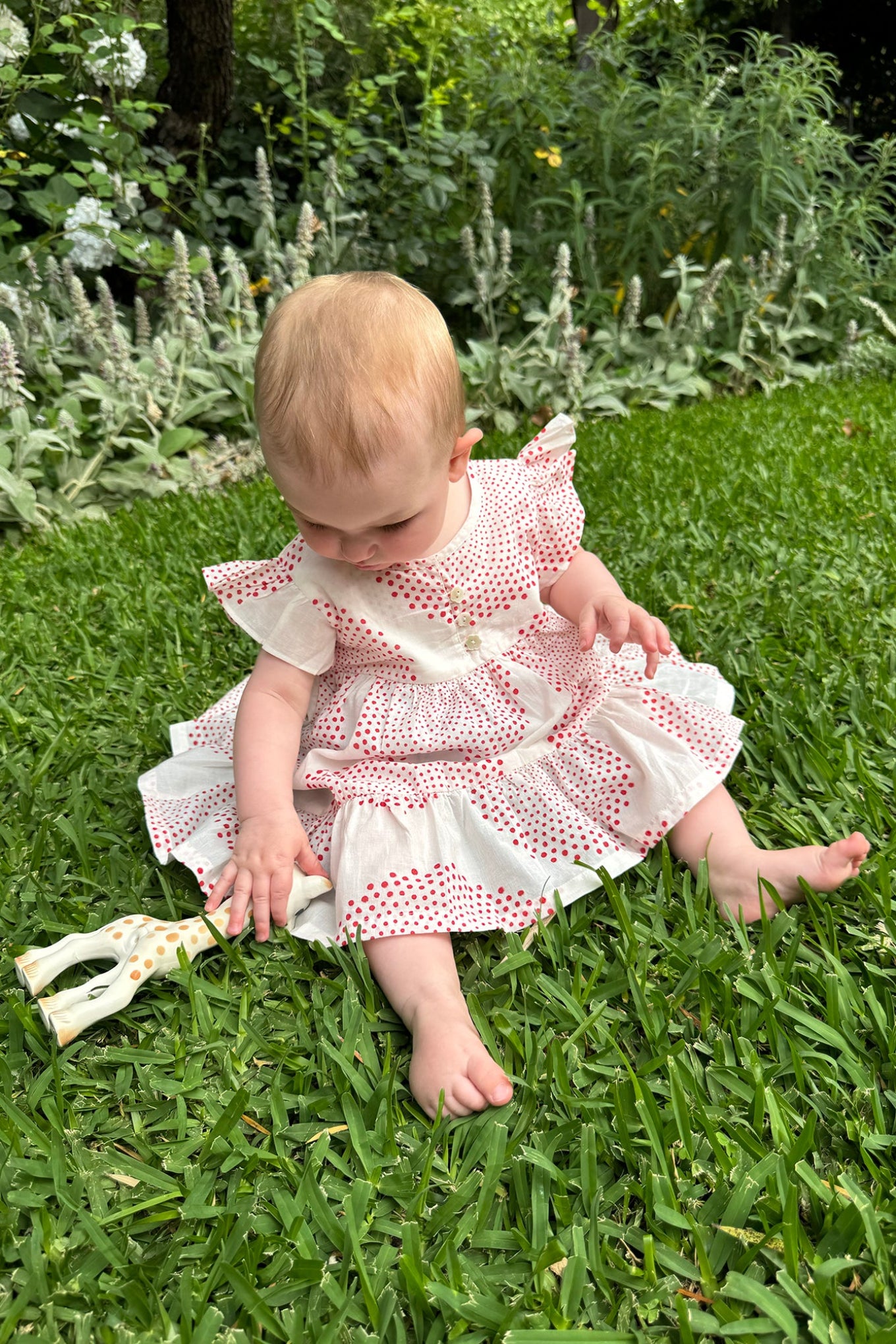 Juni Kids pure cotton blockprint baby dress in red circle dots on white.