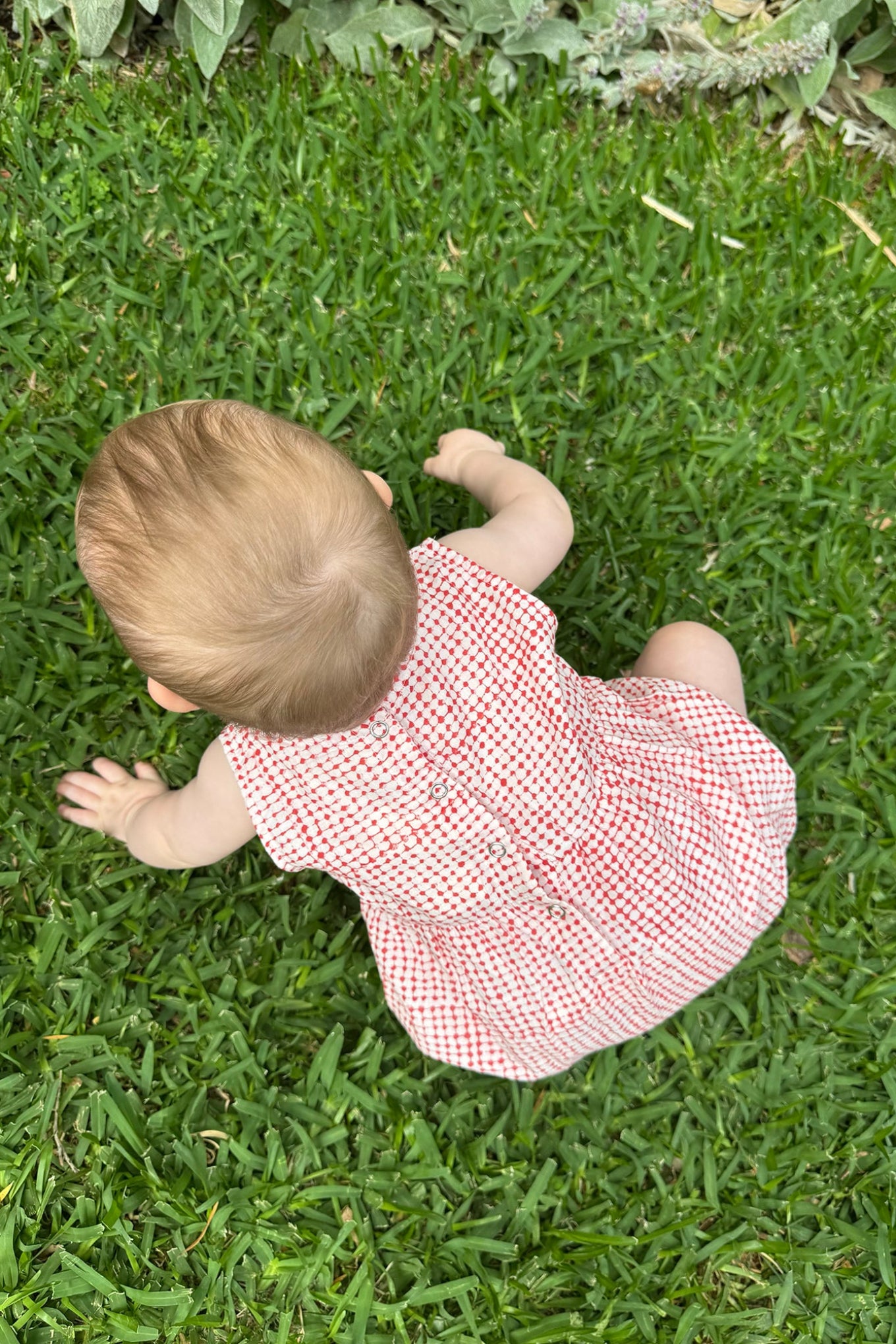 Juni Kids pure cotton blockprint baby romper in red dots on white.