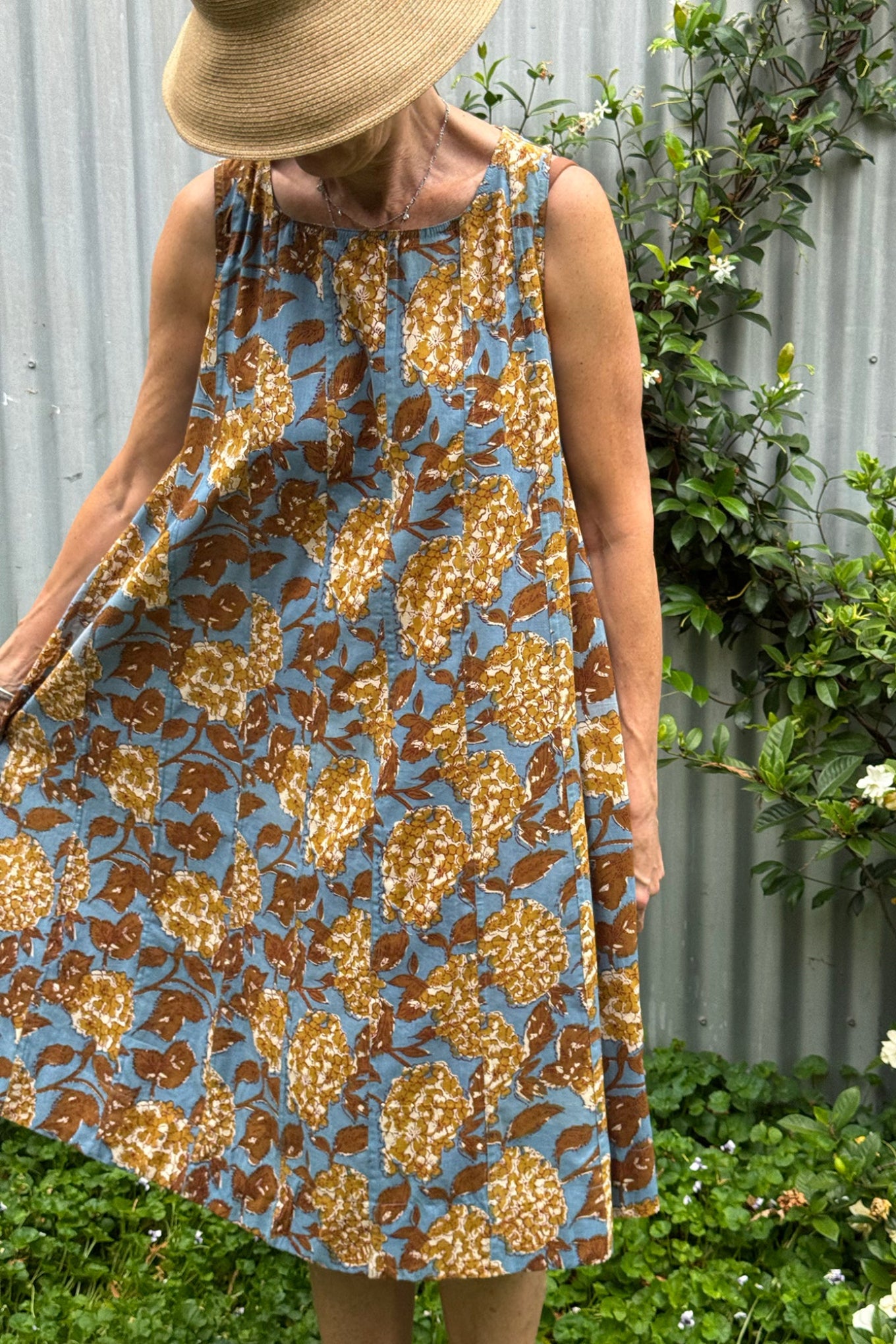 Juniper Hearth Tulsi cotton sleeveless sun dress blockprinted vintage mustard and olive hydrangea print on blue.