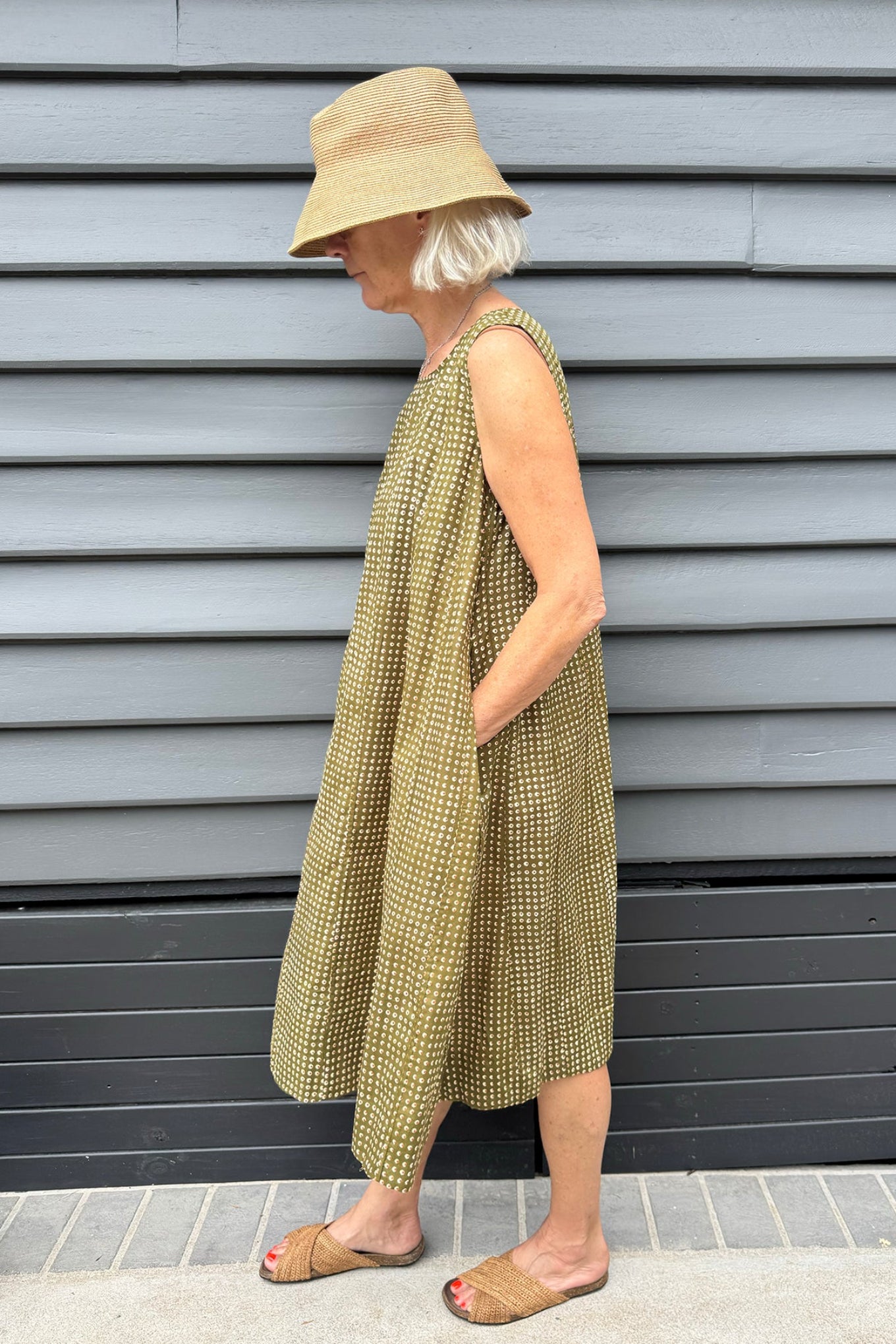 Juniper Hearth Tulsi cotton sleeveless sun dress screenprinted dots on olive green.