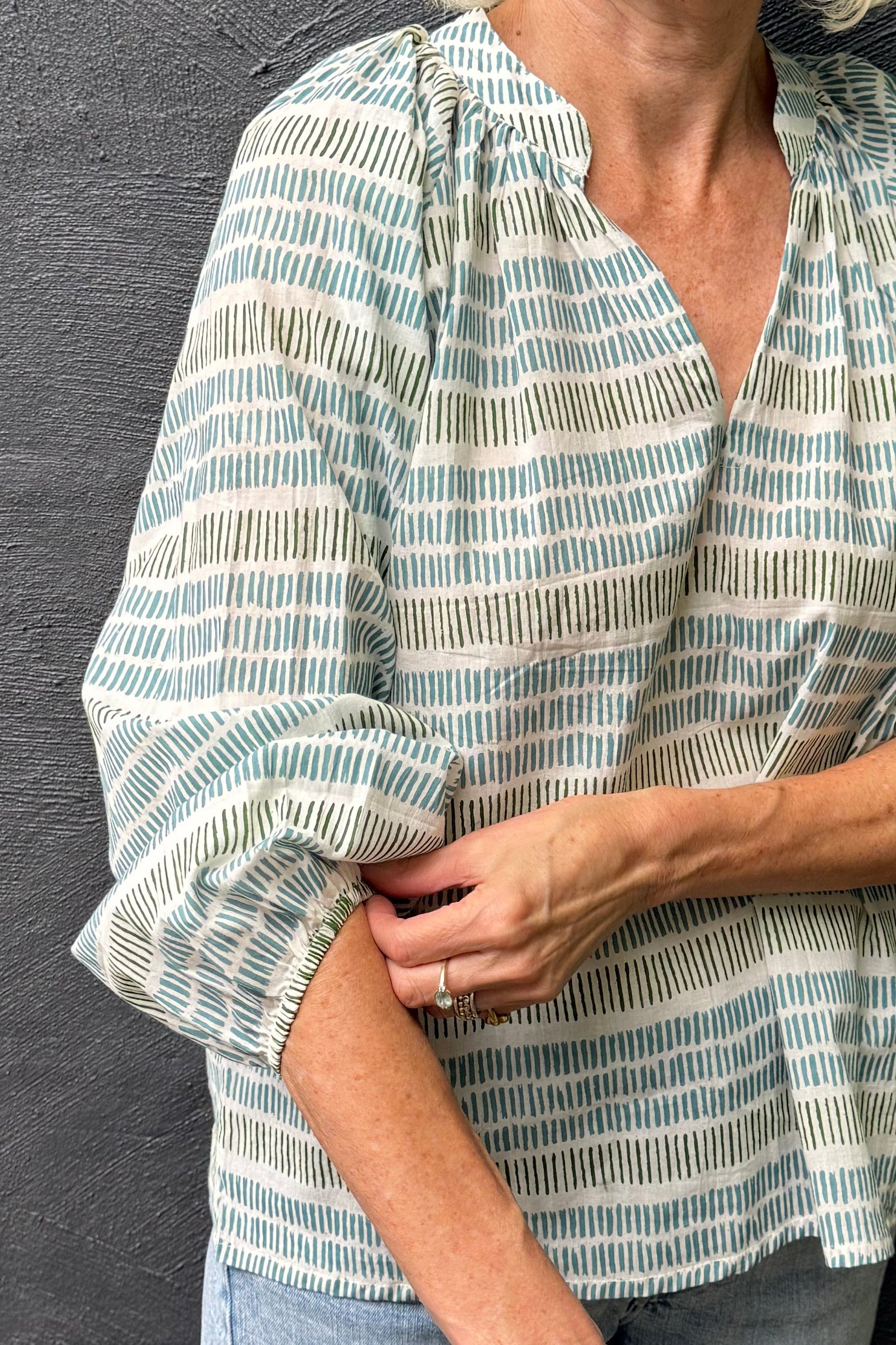 Cotton blockprint blouse white with blue and olive green stripes of stripes.