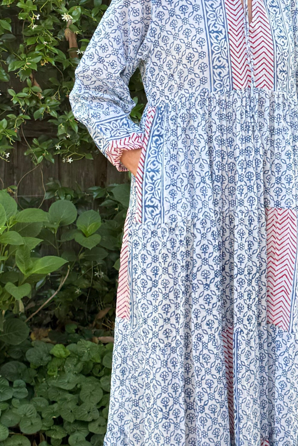 Dora Maxi dress light cotton voile blockprint maxi dress sky blue on white floral with red accents.